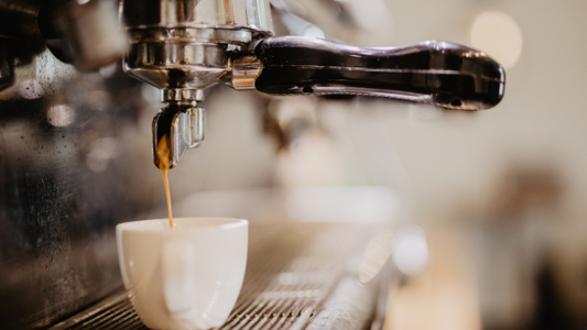 Picture of espresso shot in a clear cup.